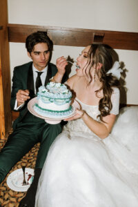 newlyweds eating cake