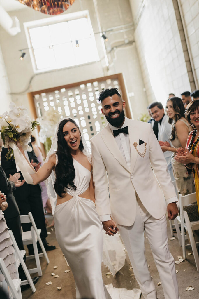 Newlyweds walking down the aisle