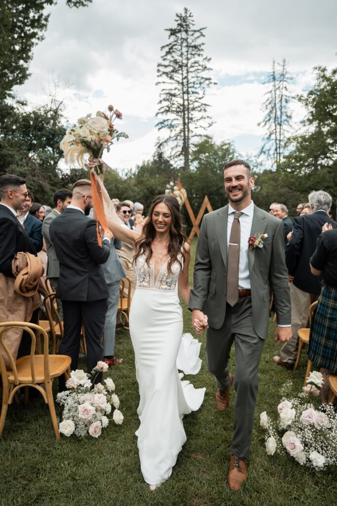 Newlyweds walking away from ceremony