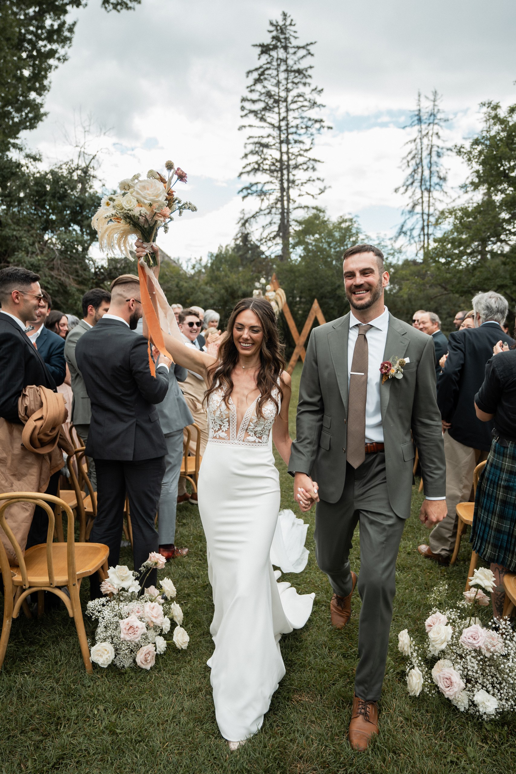 Newlyweds walking away from ceremony
